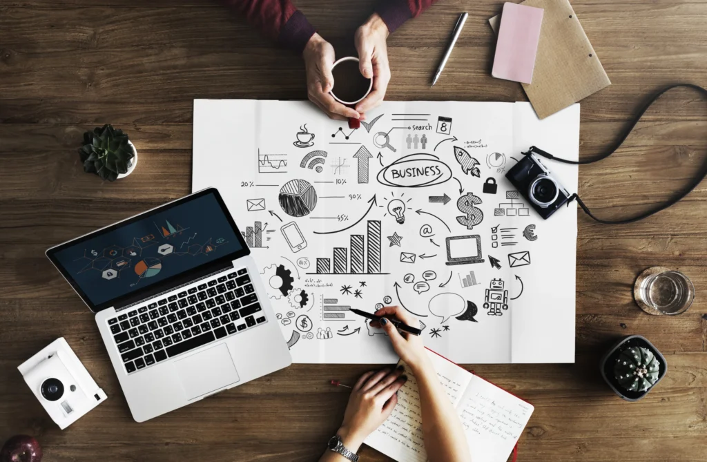 The Top 10 MarTech Partnerships Revolutionizing Modern Marketing 4 map lying wooden table scaled.jpg